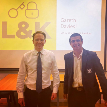 Gareth Davies MP with student and society founder Henry